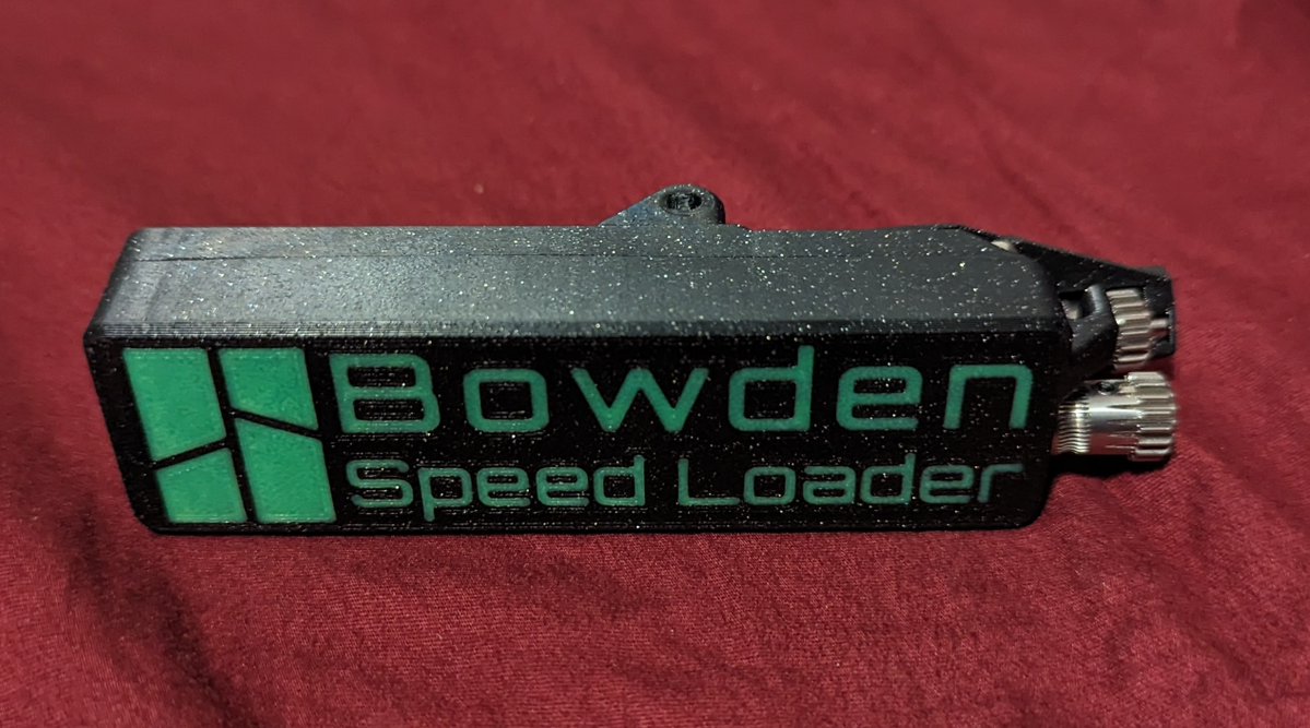 YourBuddyDinec's tweet image. Got my bowden speed loader finished for easier external filament feeding form my P1S with a @BambulabGlobal accent to it. In polymaker galaxy black and neon green ABS. #3DPrinting