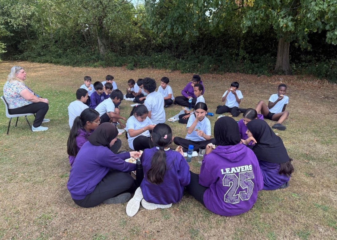 _DWPS_'s tweet image. Year 6 enjoying a picnic, having made their own sandwiches. They also enjoyed decorating cupcakes!