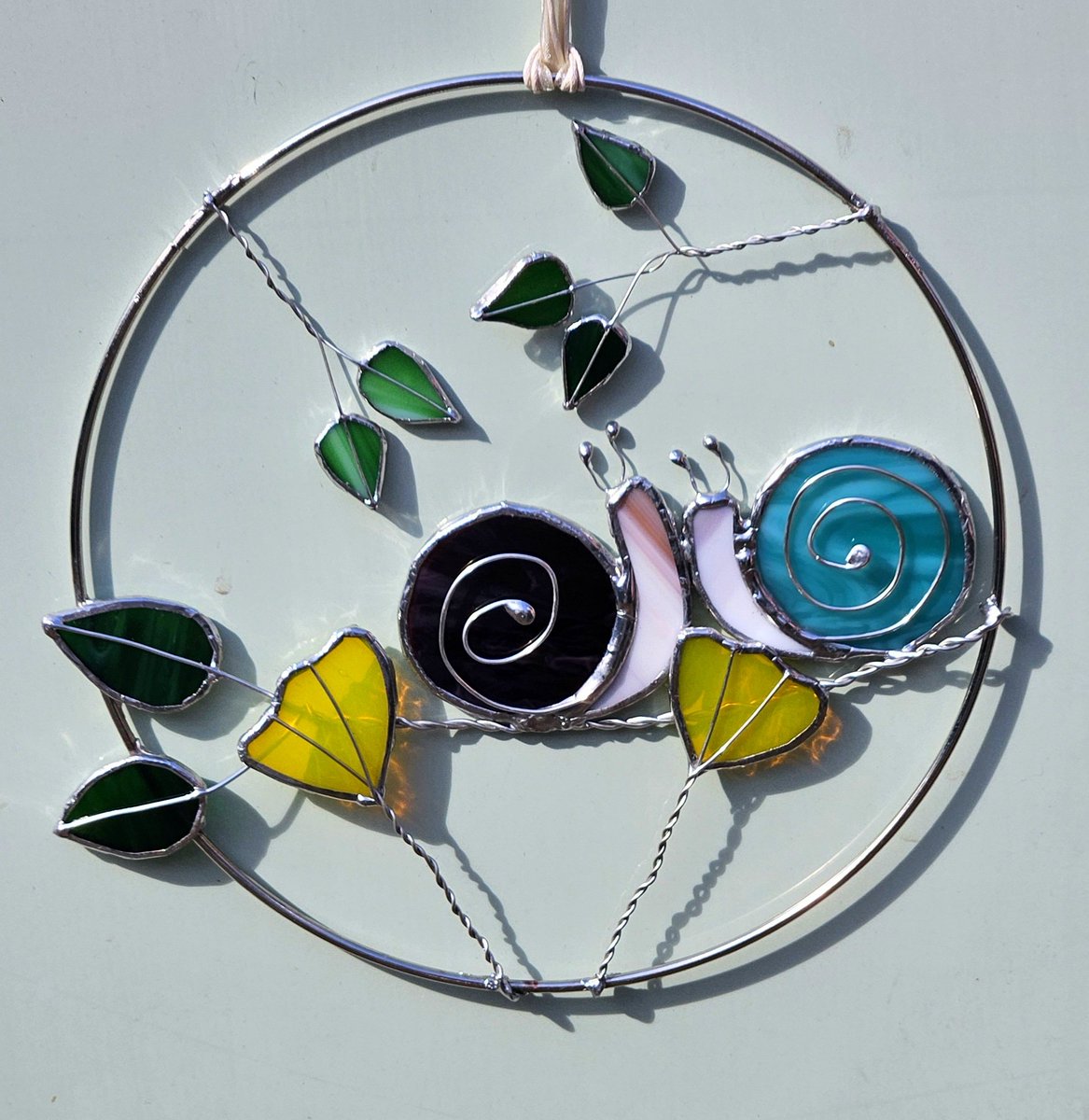 k8glassdesigns's tweet photo. A new piece ready in time for the #floatingmarket at #MarketDrayton 26 & 27 Jul. #electricboats #stainedglass #boatsthattweet #madeonaboat #buyitoffaboat #stainedglass #snails #RCTA https://t.co/OhGNSAeVlk