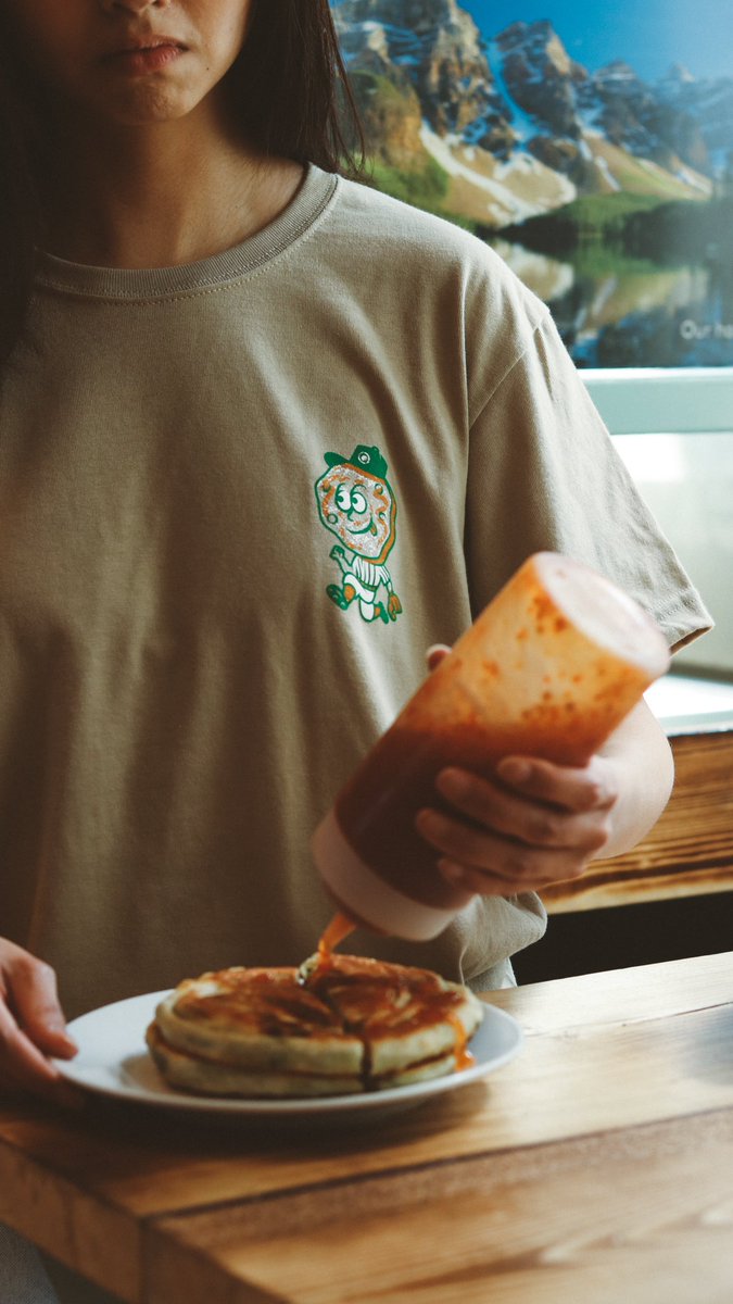 EdmRiverhawks's tweet photo. Green Onion Cake tees are back in stock at the Hawk Shop this weekend ‼️

This tee is an in-stadium exclusive… see you at RE/MAX Field 👀 https://t.co/6qg6GIPVPa