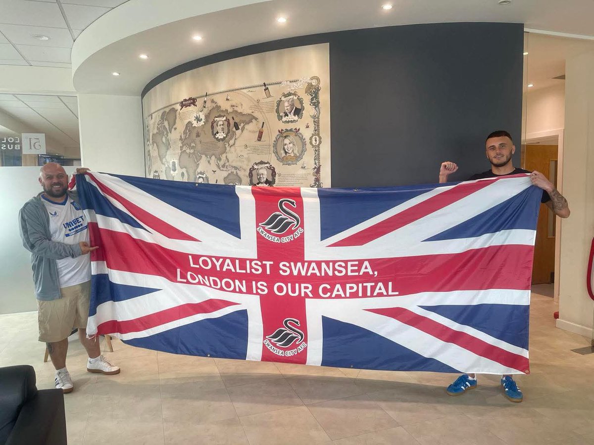 They live amongst us! 
Swansea Loyalists declare London is the capital of Wales on a Union Flag.