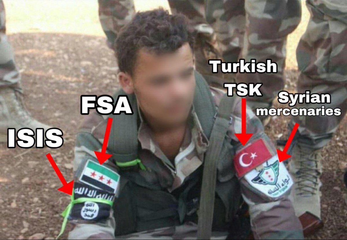 SoranHamarash's tweet image. How can one uniform tell such a story? This fighter, part of the Turkish-backed Syrian Jihadists, is wearing patches for the FSA, ISIS, and Turkey. When people ask about the alleged atrocities against Druze, Christian and other minorities, images like this speak volumes.#Syrian