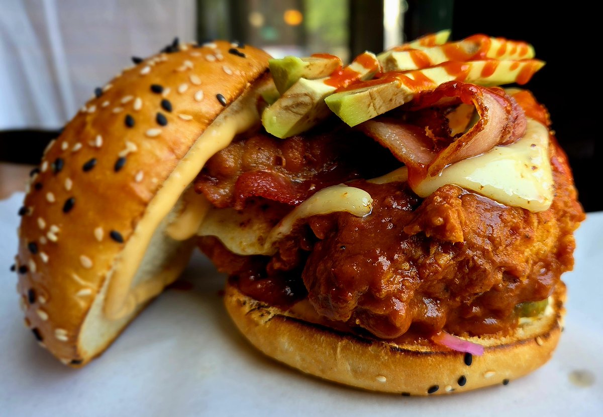 Block16Omaha's tweet image. FIREBIRD today! Crispy fried chicken tenders dunked in Daniel Montoya dynamite chipotle sauce on a sesame bun with pickles, pickled onion, ancho aioli, avocado, ghost pepper cheddar, brown sugar bacon and house spicy sauce. Summer lobster corn chowder too. Get down here!!!