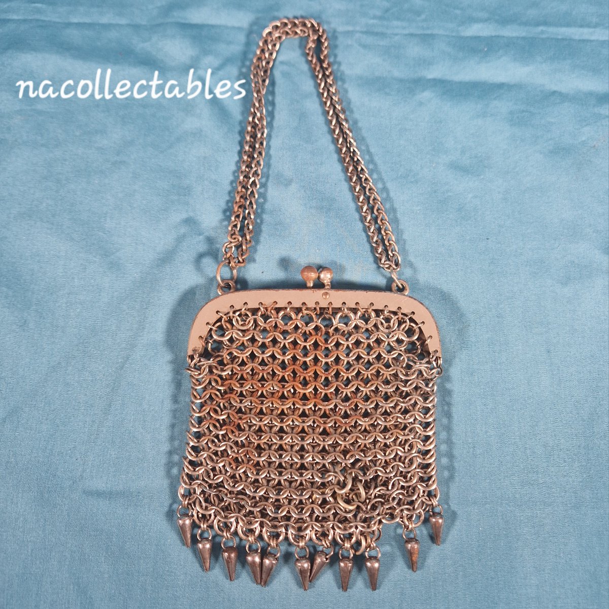 nacollectables's tweet photo. We love this steel chain mail money purse from the 1920's but it has suffered a bit. How should we get rid of the slightly rusted areas?
@EverRotating #vintageshowandsell #moneybag #chainmailbag #ArtDeco #RoaringTwenties #vintagestyle #rustremoval #VintageVibes https://t.co/5QY8ouGqng