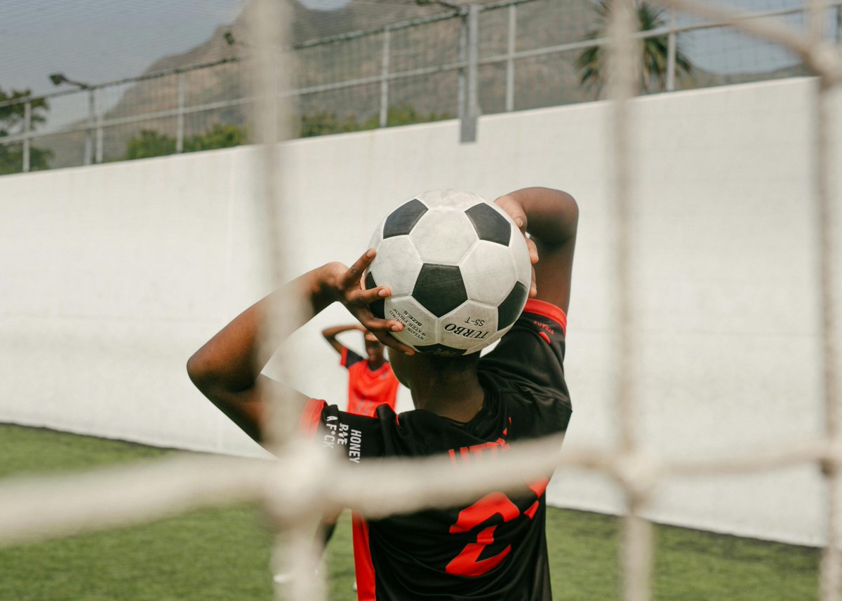 A throw-in happens when the ball goes out of bounds. The other team throws it in with both feet on the ground, and the ball over the head. Simple, but strategic.⚽