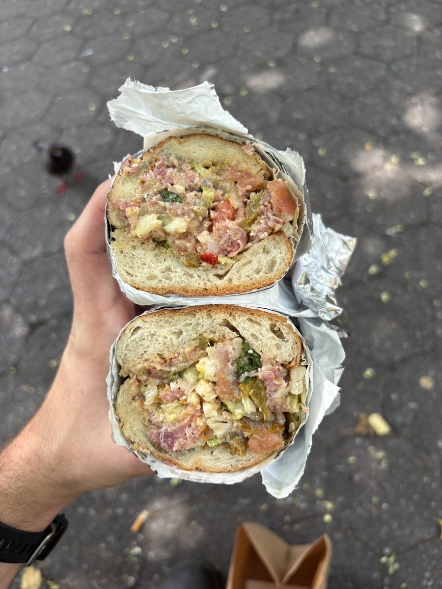 Enjoying a sandwich in the park
