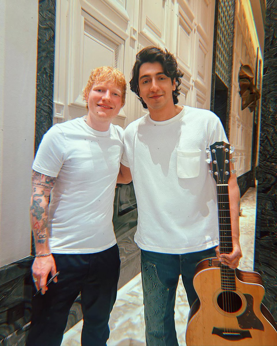 ahaanpandayyyy's tweet photo. Been prepping on this guitar for my debut film and now I have it bless-Ed by none other than @teddysphotos https://t.co/pVzdUReG5e
