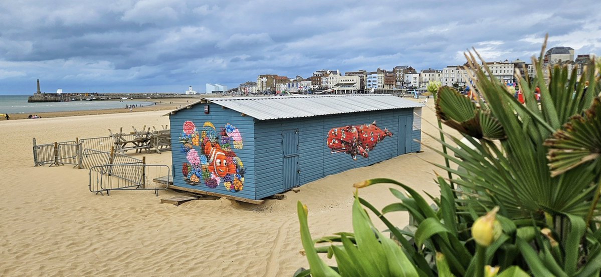 CommunityAd's tweet photo. 🎨 Dive deeper into the Seashedmargate’s colourful new look! Louis masai’s murals shine in Frank Leppard’s striking shots 📷, a bold splash of art for the UK Creative Festival in Margate 🌈🏖️

#Creative #Margate #StreetArt #Art #thanet https://t.co/T5HeWysmmu