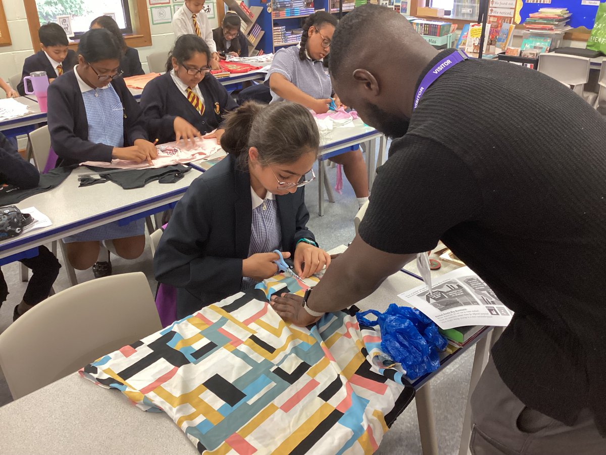 SSPP_Primary's tweet image. The Year 6 STEM Week project is seeing them turn old t.shirts into new bags. Tosin has stayed to provide them with support as they cut and sew drawing in skills from their DT textiles Maya Huipils from earlier in the year. #STEM #SSPP