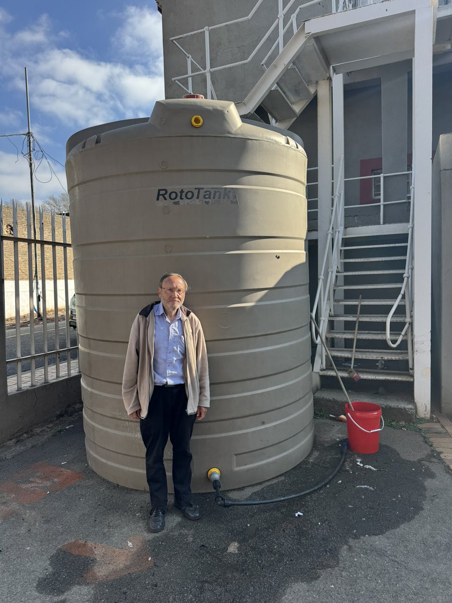 JackBloomDA's tweet image. I visited Malvern Clinic again today, still only a trickle of water after 6 weeks, and toilets closed. It won’t cost much to connect this water tank to the pipes with a pump, instead of staff using buckets.