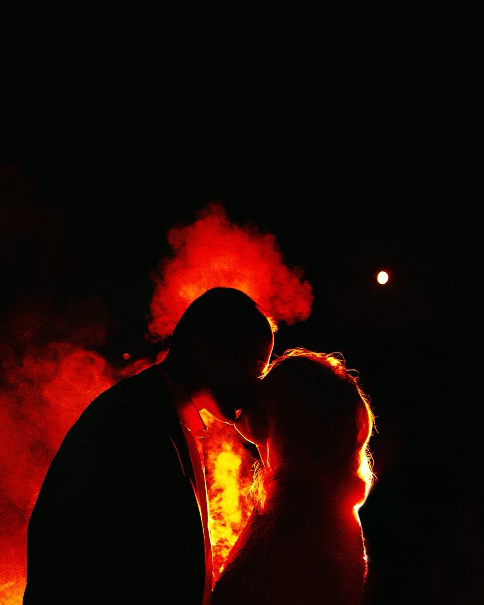 My father went out to smoke (on the street), and my mother came up to kiss him. At that moment, I took this photo.