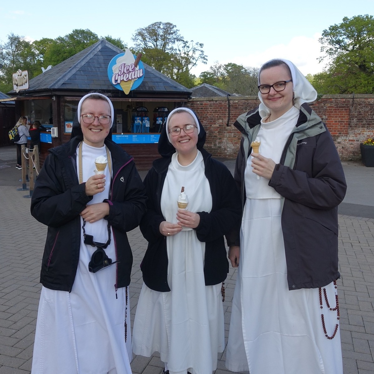 NunsHolding's tweet image. Dominican Sisters of St. Joseph @DomSrStJoseph at St. Dominic's Priory in Lymington England holding ice cream cones. Photo from the Sisters' Facebook page at facebook.com/OPSisters/post….