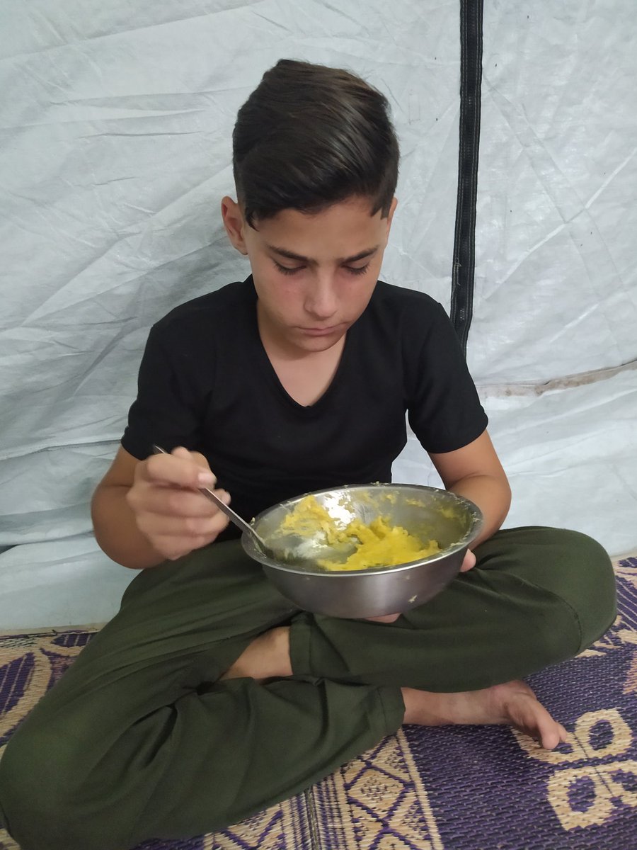 Where are you? Are we alone in this world?
Are we in a desert where no one hears?
Donations are scarce, and hunger is ravaging innocent bodies.
My brother Hassan, a child no more than a few years old,
is crying for food...
His tears are hidden, his voice is inaudible.
His screams