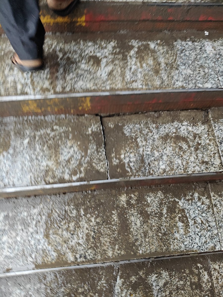 <a href="/rushikesh_agre_/">Mumbai Rains</a> New Ghatkopar station bridge condition after first heavy rain. Granite were laid recently but material below it washed away.