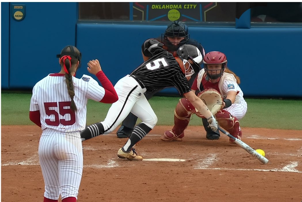 Is this what we want to be allowed in our game? (Her foot is in front of the plate, in the strike zone, not on the plate). 
There’s a NCAA Softball rule on the table to allow the batter to step outside the batters box as long as part of her foot is still on the chalk. 

This