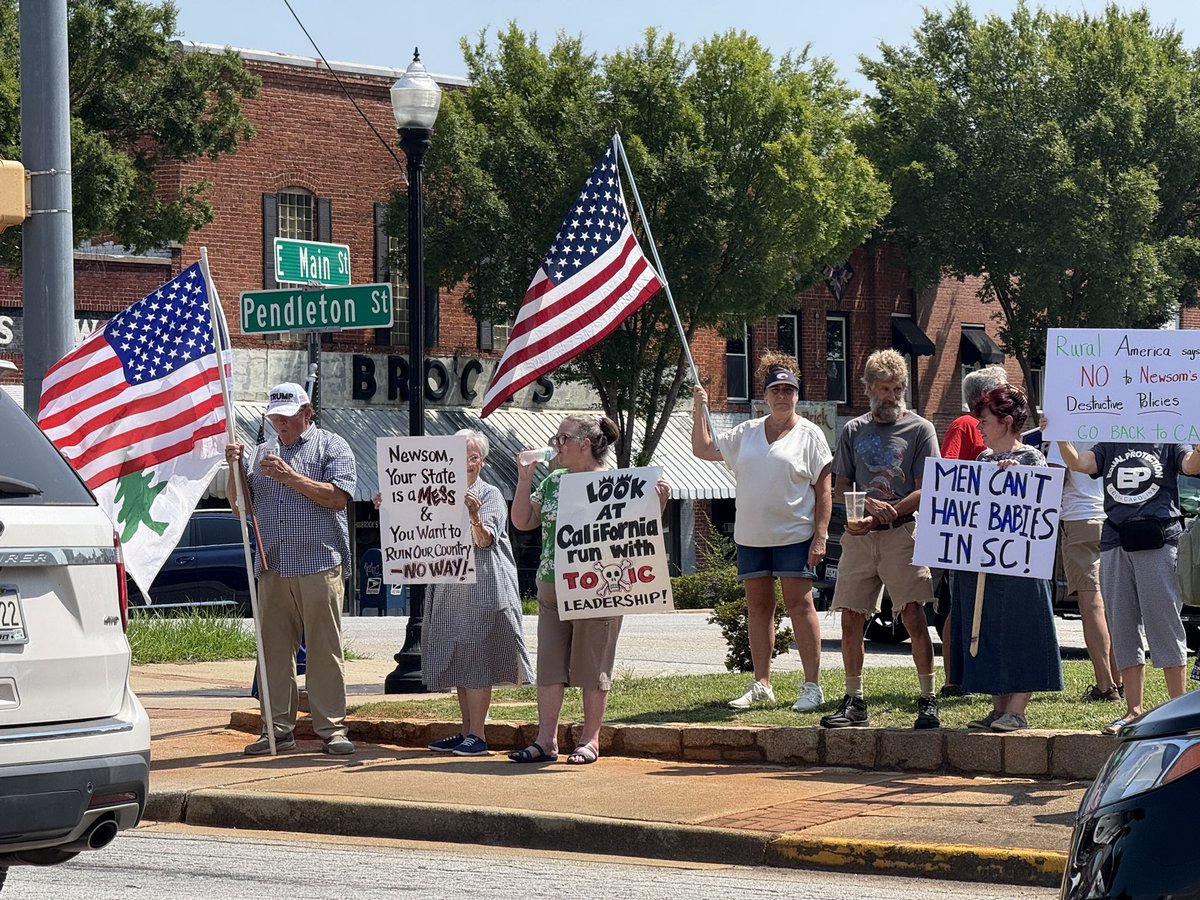anniebryson28's tweet image. About 30 people protest CA Governor Gavin Newsom's visit to Pickens, South Carolina
