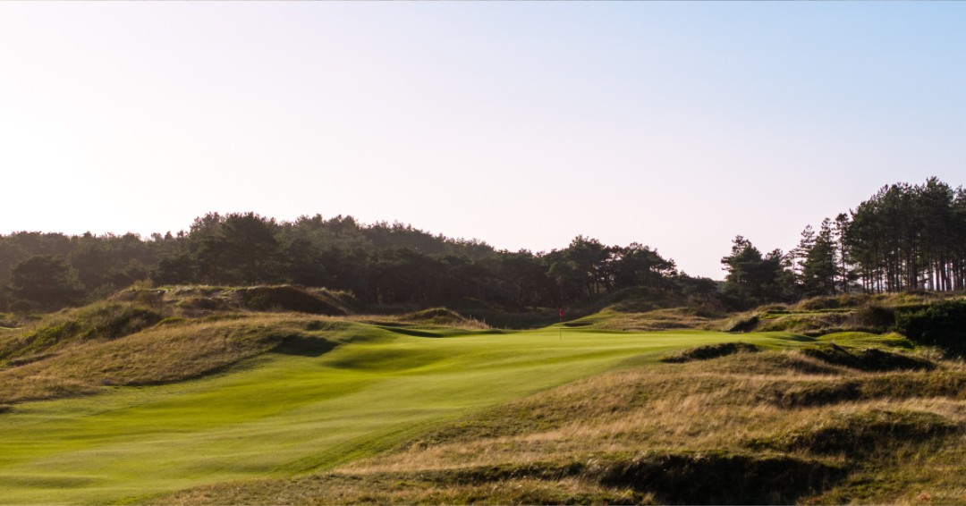 The stunning 11th green, beautifully mowed on the peak of a dune ridge, is one of the most natural green complexes you'll ever find.