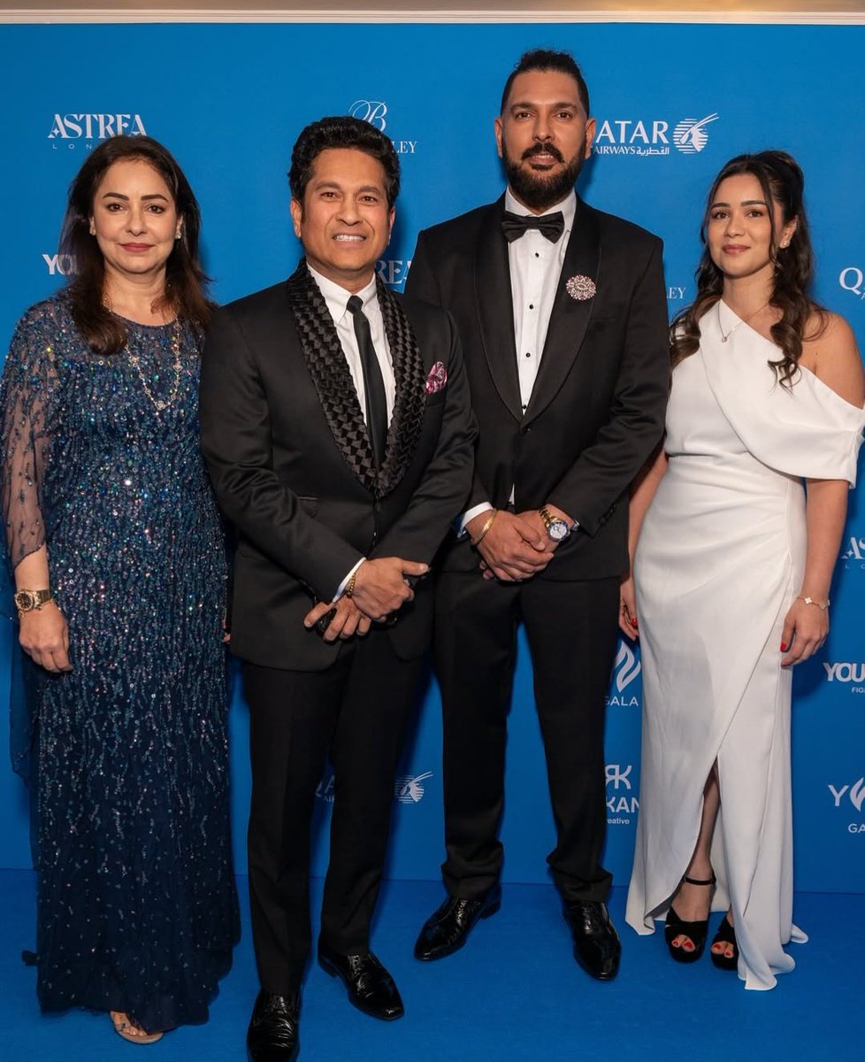 Sachin Tendulkar &amp; his family with Yuvraj Singh at his YWC event in London.