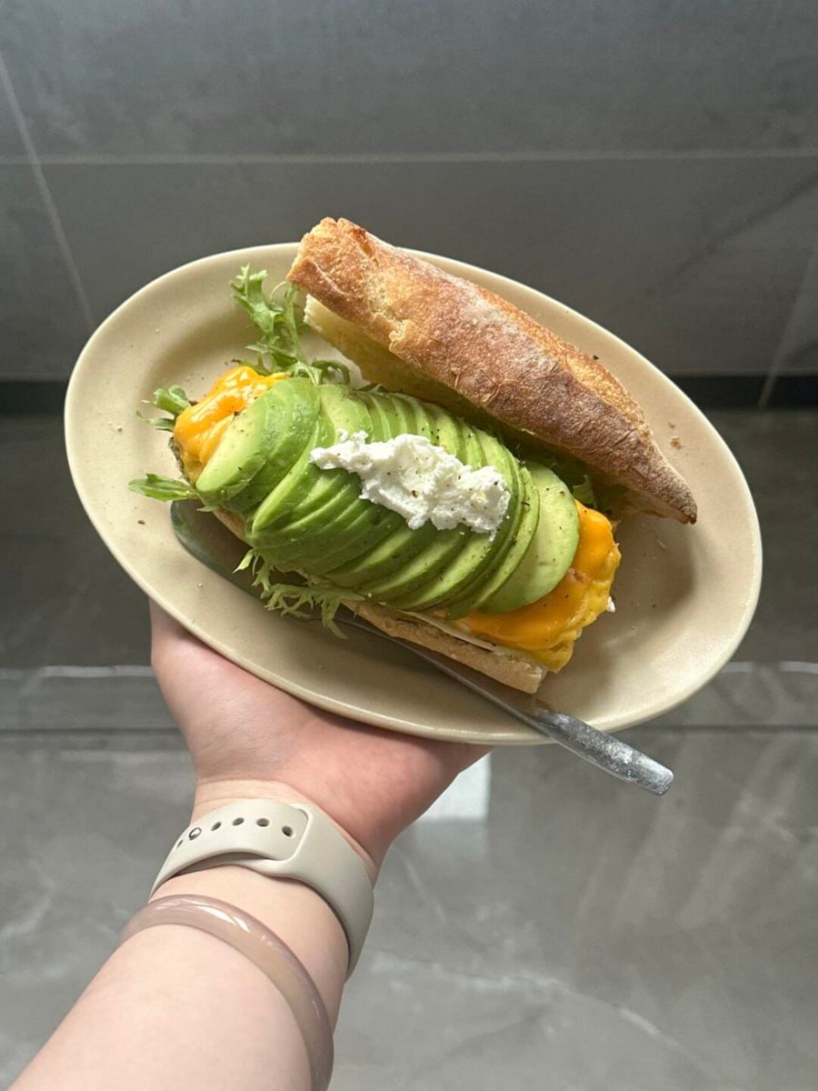 Starting the day with green goodness &amp; cheesy comfort. Avocado toast, but make it gourmet. 💚🍞