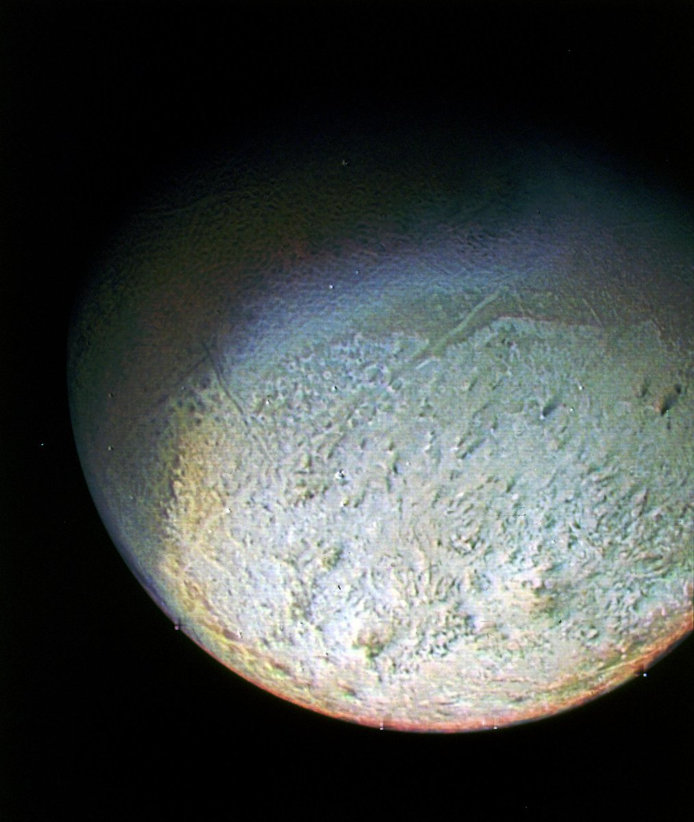 NASAAmes's tweet image. Many moons ago, Neptune’s largest moon, Triton, was pictured through green, violet, and ultraviolet filters.
While regions that are highly reflective in the ultraviolet appear blue in this image, there is no part of Triton that would appear blue to the eye. More about Triton:…