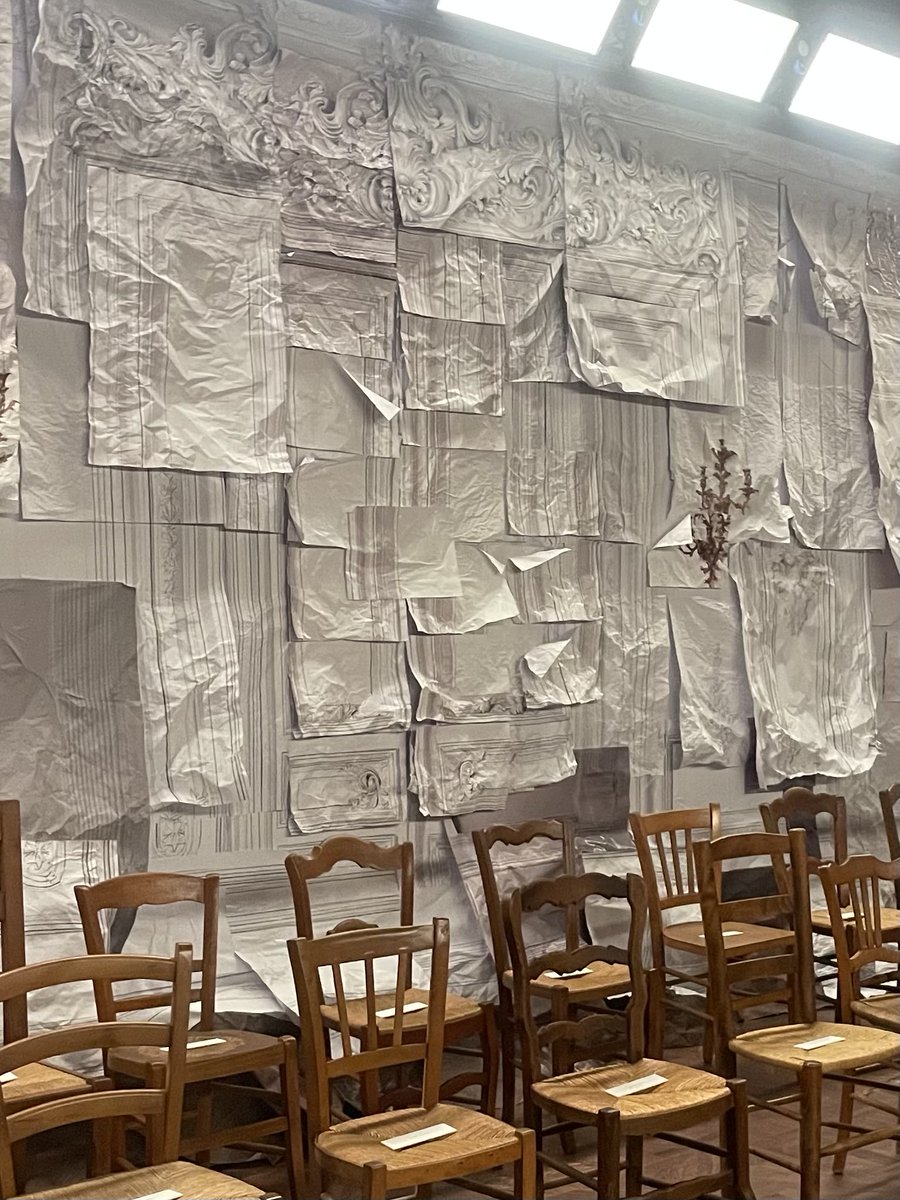 VVFriedman's tweet image. The venue for Glenn Martens’ first Maison Margiela couture show, walks covered in scrap papier mâché. This was also the venue of Martin Margiela’s last show, in 2008.