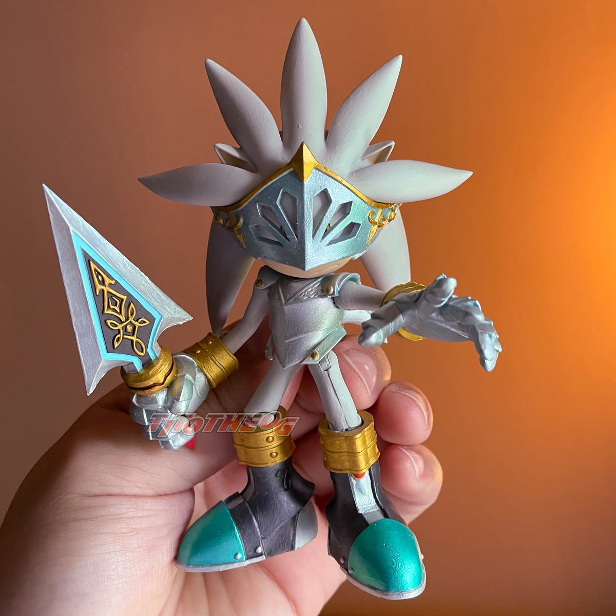 TitoTheOG's tweet image. “The future is not written in stone—but I will carve it with honor.” - Sir Galahad if he spoke probably.
(Commission)
Here is my NEW AND IMPROVED custom Sir Galahad Silver the Hedgehog action figure! Using Jakks Pacific Sonic body instead of Silver -since Jakks made him too fat