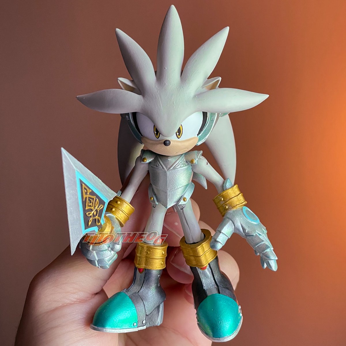 TitoTheOG's tweet image. “The future is not written in stone—but I will carve it with honor.” - Sir Galahad if he spoke probably.
(Commission)
Here is my NEW AND IMPROVED custom Sir Galahad Silver the Hedgehog action figure! Using Jakks Pacific Sonic body instead of Silver -since Jakks made him too fat