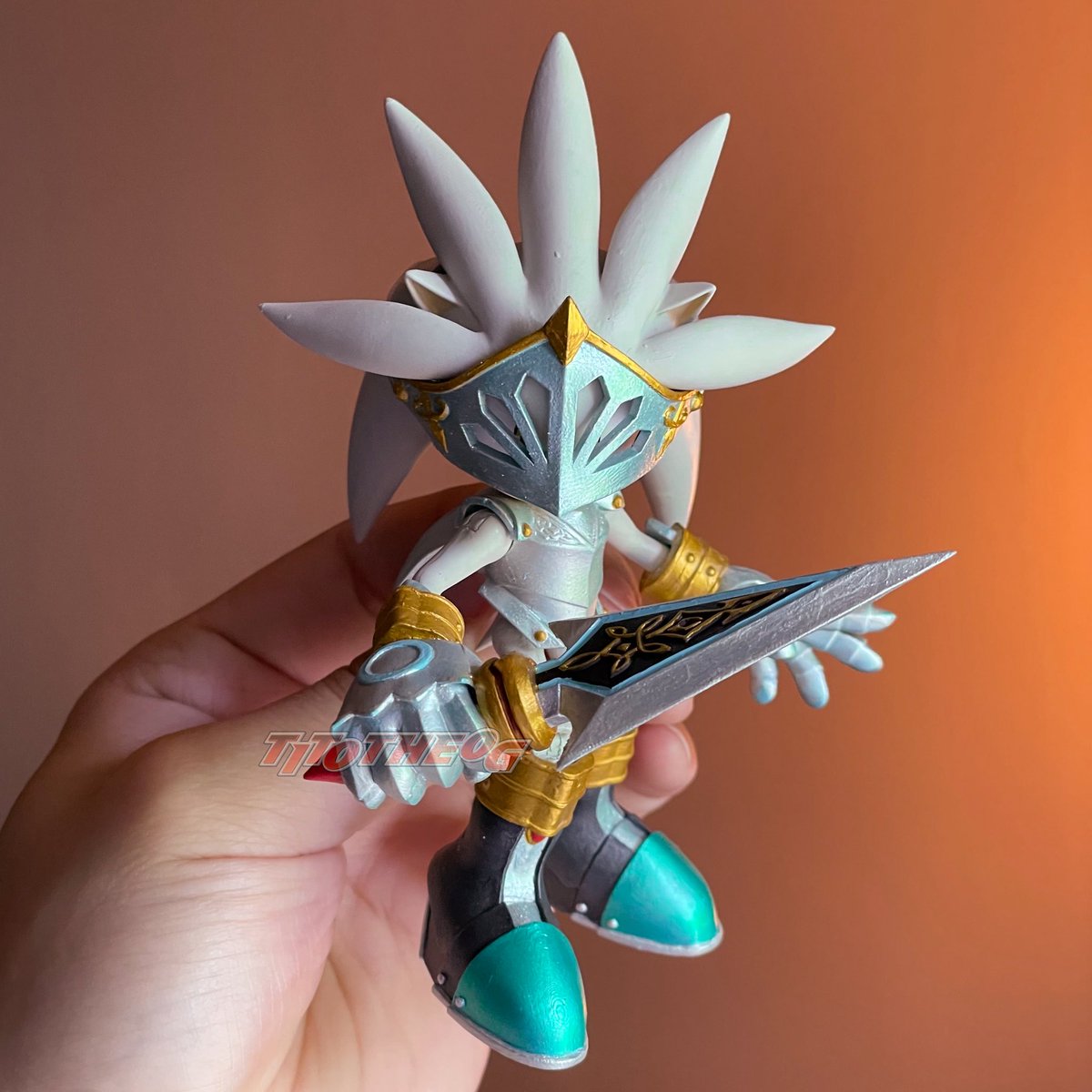 TitoTheOG's tweet image. “The future is not written in stone—but I will carve it with honor.” - Sir Galahad if he spoke probably.
(Commission)
Here is my NEW AND IMPROVED custom Sir Galahad Silver the Hedgehog action figure! Using Jakks Pacific Sonic body instead of Silver -since Jakks made him too fat