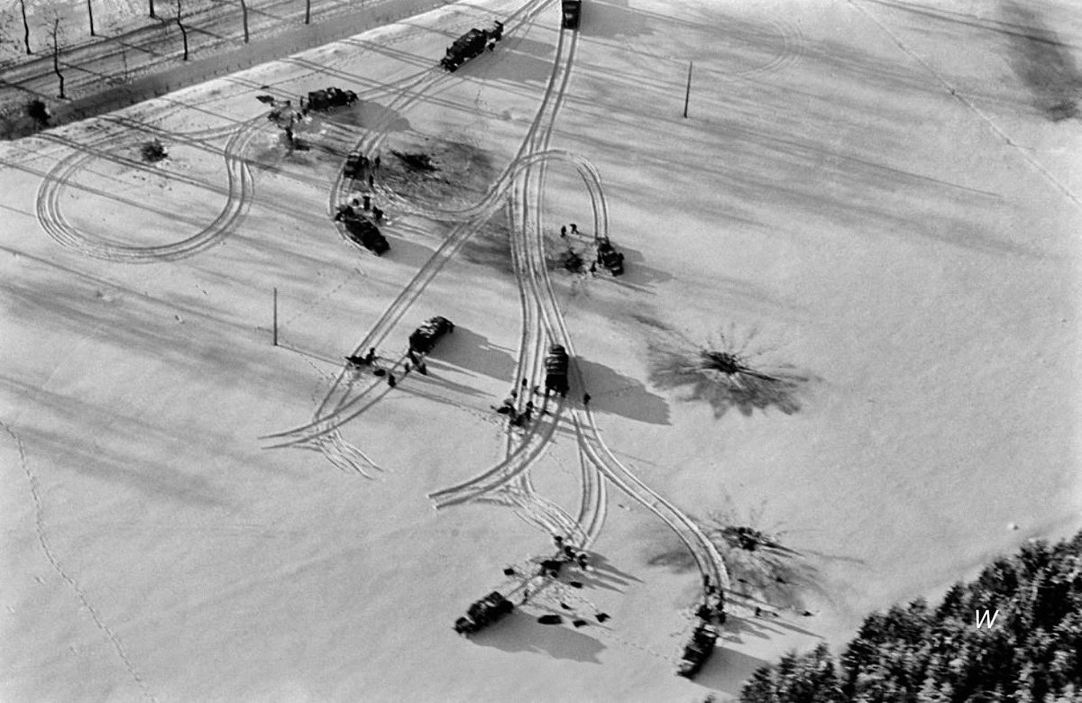 TheWorldatWar2's tweet photo. US trucks and half-tracks make their way across a snow-covered field during the Battle of the Bulge - Ardennes, Dec 1944 #usarmy #belgium #ardennes #halftrack #truck #snow #battleofthebulge https://t.co/Al8A2AspPZ