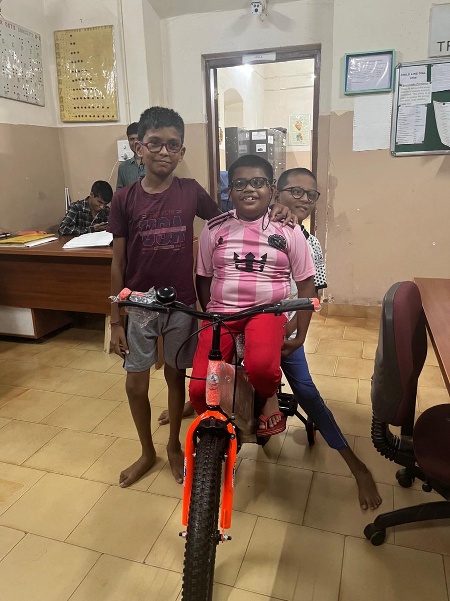 Our children enjoying the bicycle ride at Nab centre donated by Rekha Dsilva.