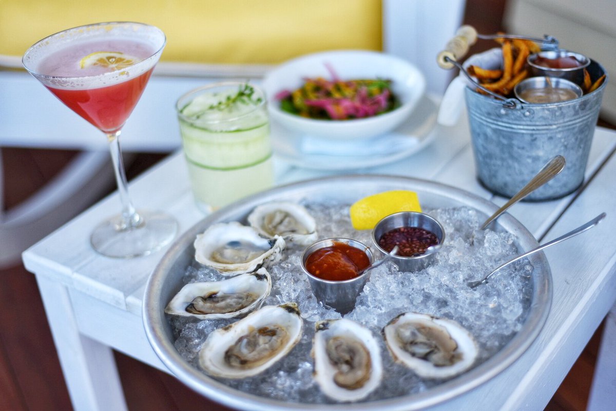 Summer sips and eats. 🦪🍹 #MaineThing