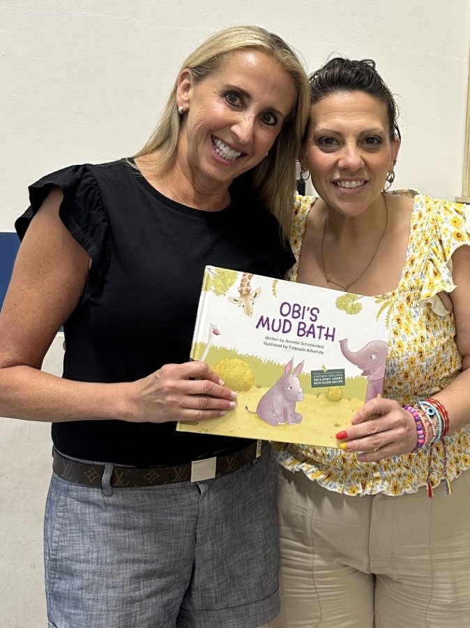 nettschott's tweet image. Obi  is beating the heat with Celebrate Summer campers - thank you Marina  and all the great counselors at this unbelievable program! @FolasadeAdeshida Water.org #camp #kidlit