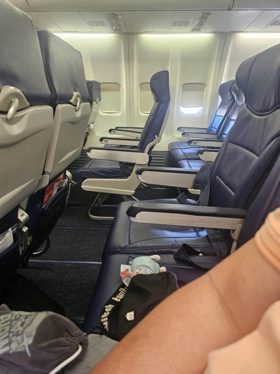 I was tempted to act like Im sitting on a sofa. Legs up, enjoying my flight ✈️