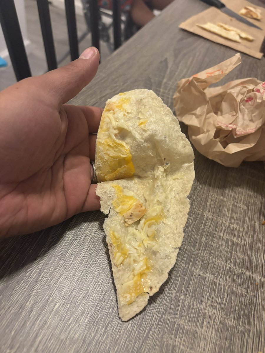 Money_tree24's tweet photo. @tacobell what kinda quesadilla is this!? https://t.co/c4C1LqsqDF