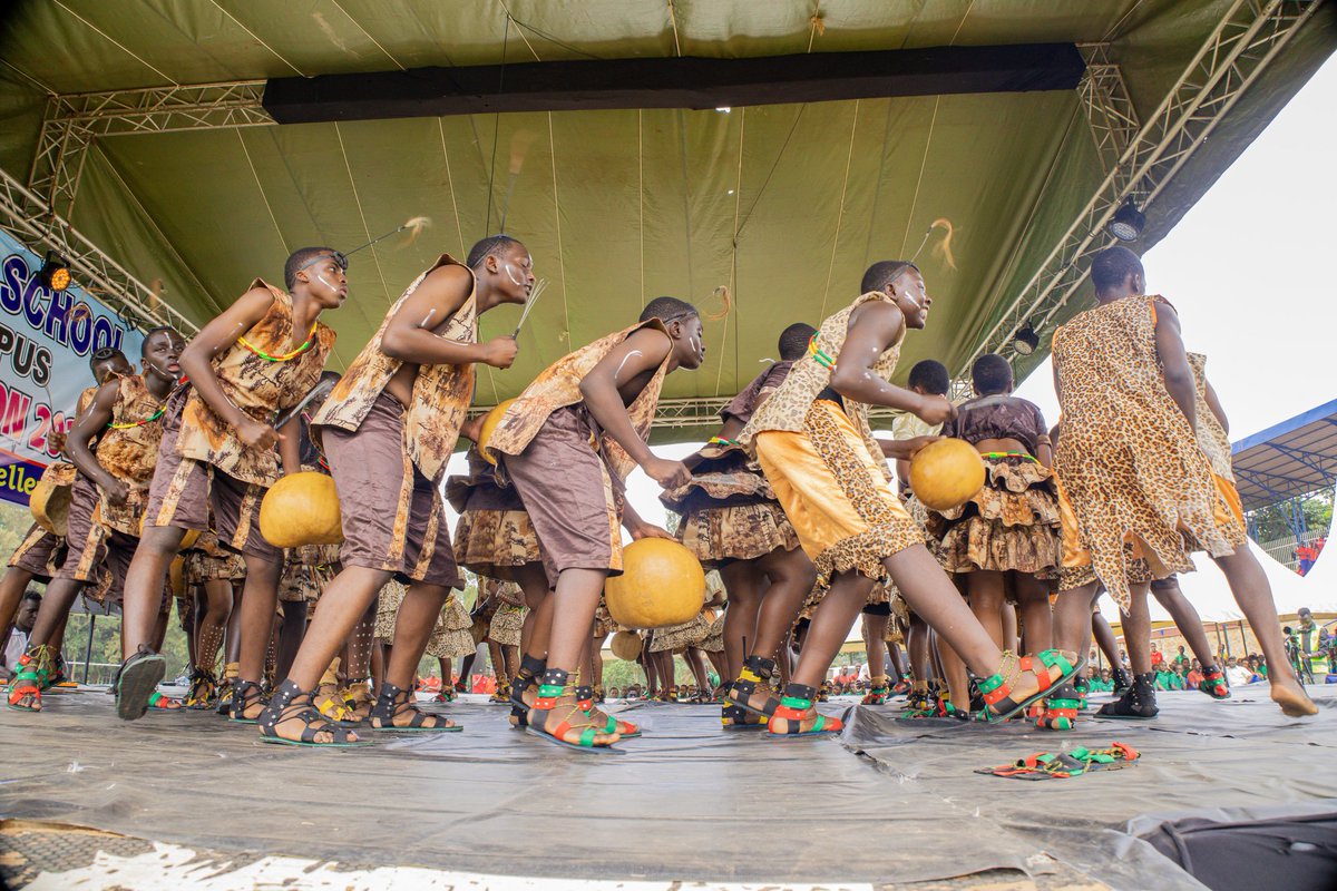 TeenzCrown's tweet photo. Feel the fire, hear the rhythm, and watch tradition come alive! 🔥💃🏾 Chwa House lit up the stage with the vibrant energy of the Raka Raka dance — a true celebration of culture and spirit! 🌍✨ #RakaRakaVibes #CulturalRhythms #TraditionInAction #UgandanHeritage https://t.co/VSgcam55UE