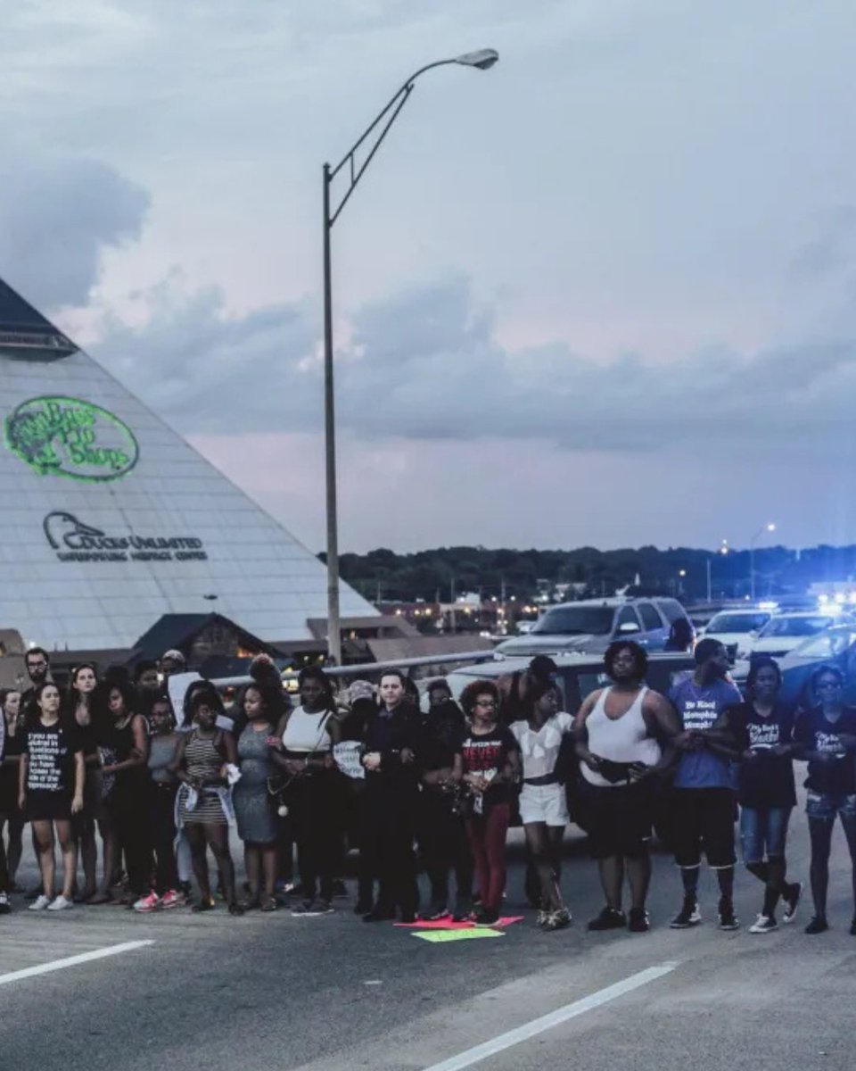 NCRMuseum's tweet photo. #OnThisDay in 2016, citizens marched up I-40's Hernando- Desoto Bridge, which crosses the Mississippi River, and blocked traffic, using this act to protest police killings, racial oppression and economic injustice. Two years later, has our city changed? #FreedomForward https://t.co/V03rToOPbx