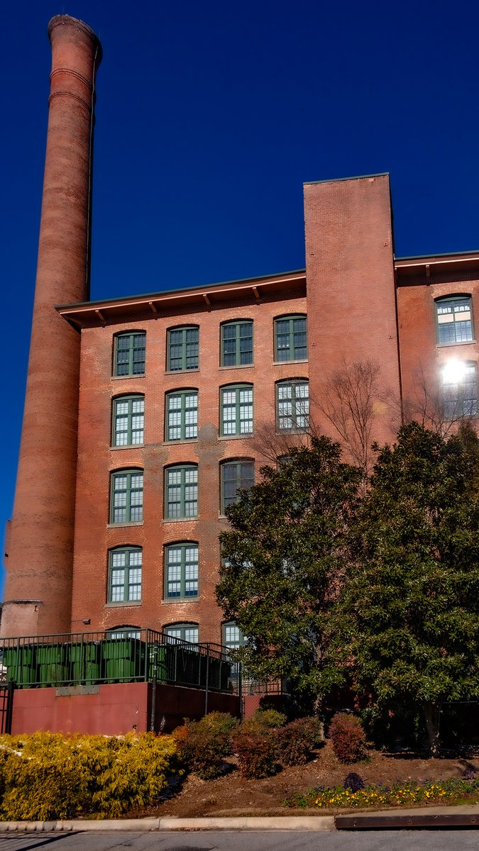 Architects talk about designing to an “industrial aesthetic,” but forget that the great mill buildings of 1880-1920 were extremely simple and repetitive. Unusually calm design would serve them well.