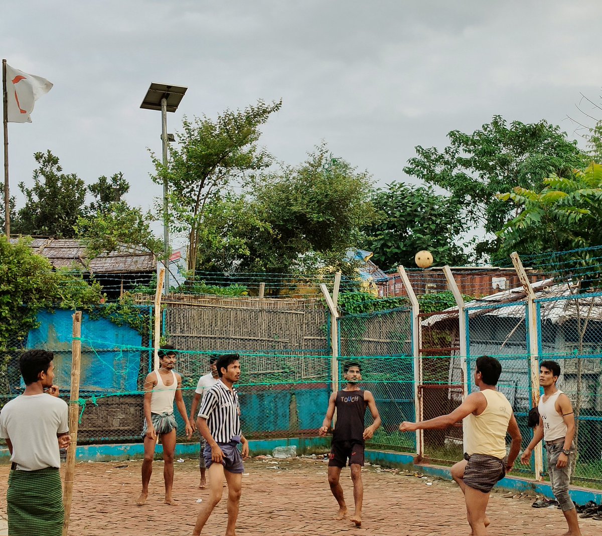 RoAnisHlaMyint's tweet photo. In the Rohingya camp, some young people are playing with a #chillone beside the roadside.
#Rohingya #Hope #ChildhoodJoy #Resilience #Community #chillone #EverydayMoments
#streetphotography 
#photography 
#documentary 

@RoAnisHlaMyint https://t.co/LekJVrl6Gg