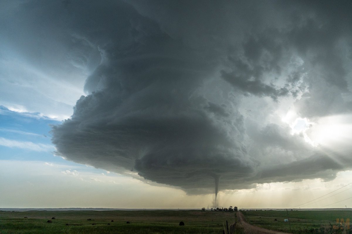 There are two tornadoes in this photo.