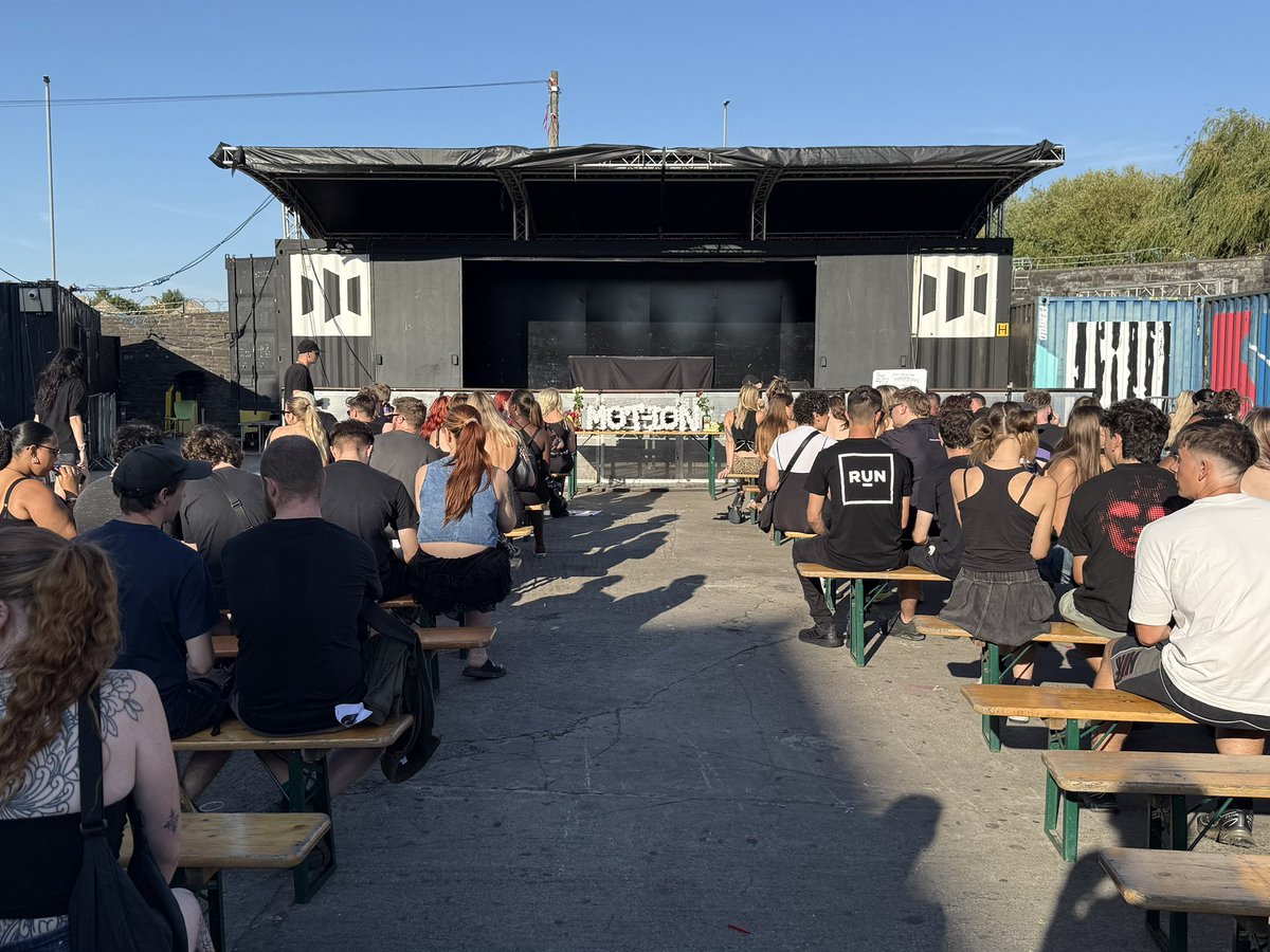 beardedjourno's tweet image. A funeral for Motion is getting underway soon. Mourners are dressed in black and a coffin will soon be carried in a solemn procession.