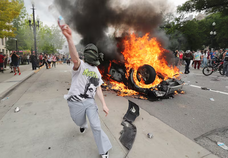 Did the Left complaint about masks when all the BLM and other protestors were looting and burning stores?  Maybe they should pass a law banning masks when protesting peacefully...?