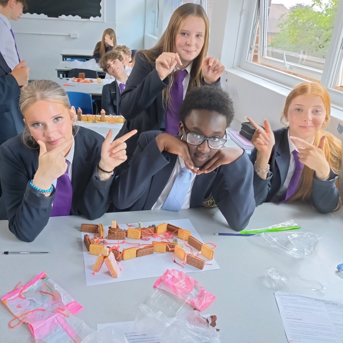 Year 9 have been studying the Cold War and brought history to life by building their own Berlin Walls out of biscuits!

They explored why the wall went up and why it came down – with plenty of biscuits, sweets, and creativity along the way.

Great work, historians!