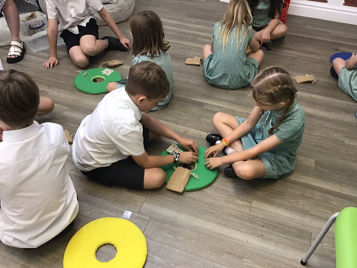 Our workshop continued up in the discovery den where we got to play an ancient Roman board game and explore some special artefacts up close!