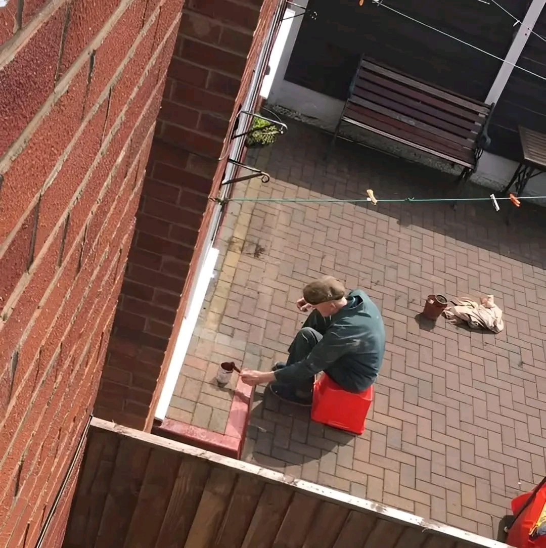 "This is Albert, he is one of my customers on my window round. He was out painting his fence. 
He is 95 years old  he's always up to something. He does all his own DIY, walks once a week 1 mile to shopping, carrying his goods back. He cooks nearly everyday a full Sunday lunch for