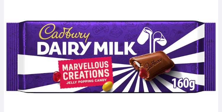 pilkkyo's tweet image. I bought this chocolate bar yesterday and it's SO GOOD like theres smaller chocolates and jelly beans and popping candy within the chocolate bar ITS AMAZING but IT'S £2.50 AND IM BROKE SO IF I FINISH IT TOO QUICK I CANT JUST BUY ANOTHER ONE BUT IT TASTES SO GOOD AAA