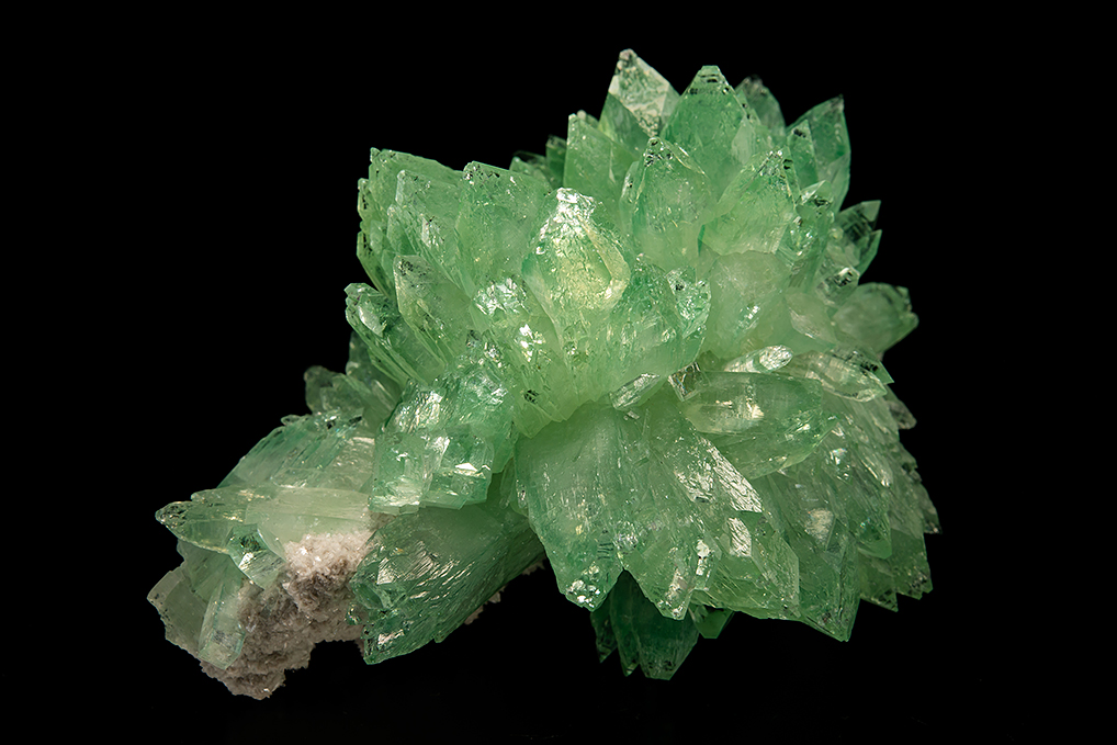 geologyBits's tweet photo. In Geology ✔️ Mineralogy - Botany
#Mineralogy #Fluorapophyllite #Geology #CrystalCollecting
🔁 Fluorapophyllite: Nature’s Shimmering Crystal Marvel
▶️ Imagine a mineral that gleams like liquid light, its translucent beauty captivating collectors and geologists alike.
Fluorapophyllite is a geological treasure, discover its story, science, and secrets!
Formation Story
Fluorapophyllite forms in the heart of volcanic rocks, born from the cooling of magma in cavities known as vesicles or geodes.
As hydrothermal fluids
rich in silica, calcium, and fluorine percolate through these cavities, they crystallize under precise conditions of temperature and pressure.
Over millennia
these processes create Fluorapophyllite’s signature prismatic or tabular crystals, often found in association with minerals like Stilbite and Heulandite.
Its radiant, glassy luster
and delicate green, white, or colorless hues make it a standout in any mineral collection.
Geological Information
Fluorapophyllite, a hydrous potassium calcium silicate fluoride, belongs to the phyllosilicate mineral group.
Its chemical formula
KCa4(Si8O20)(F,OH)·8H2O, reflects its complex structure, featuring layers of silicate tetrahedra.
It typically forms
in basaltic environments, particularly in the Deccan Traps of India, as well as in regions like Brazil, Iceland, and the United States.
The mineral exhibits
perfect basal cleavage, meaning it splits cleanly along one plane, and has a Mohs hardness of 4.5–5, making it relatively soft yet durable for display.
Its crystals often form
as tetragonal prisms or pseudo-cubic shapes, with a vitreous to pearly luster.
Fluorapophyllite’s transparency
and fluorescence under UV light enhance its allure, with some specimens glowing in soft greens or blues due to trace impurities.
▶️ Interesting Fact
Fluorapophyllite is prized not only for its beauty but also for its rarity in certain forms.
Some specimens
from Pune, India, display a unique “fish-tail” crystal habit, resembling a mermaid’s tail, making them highly sought after by collectors worldwide.
💥 Have you ever seen Fluorapophyllite’s mesmerizing glow under UV light, or do you have a favorite crystal in your collection?
🔁 Like & Share your thoughts or photos below!