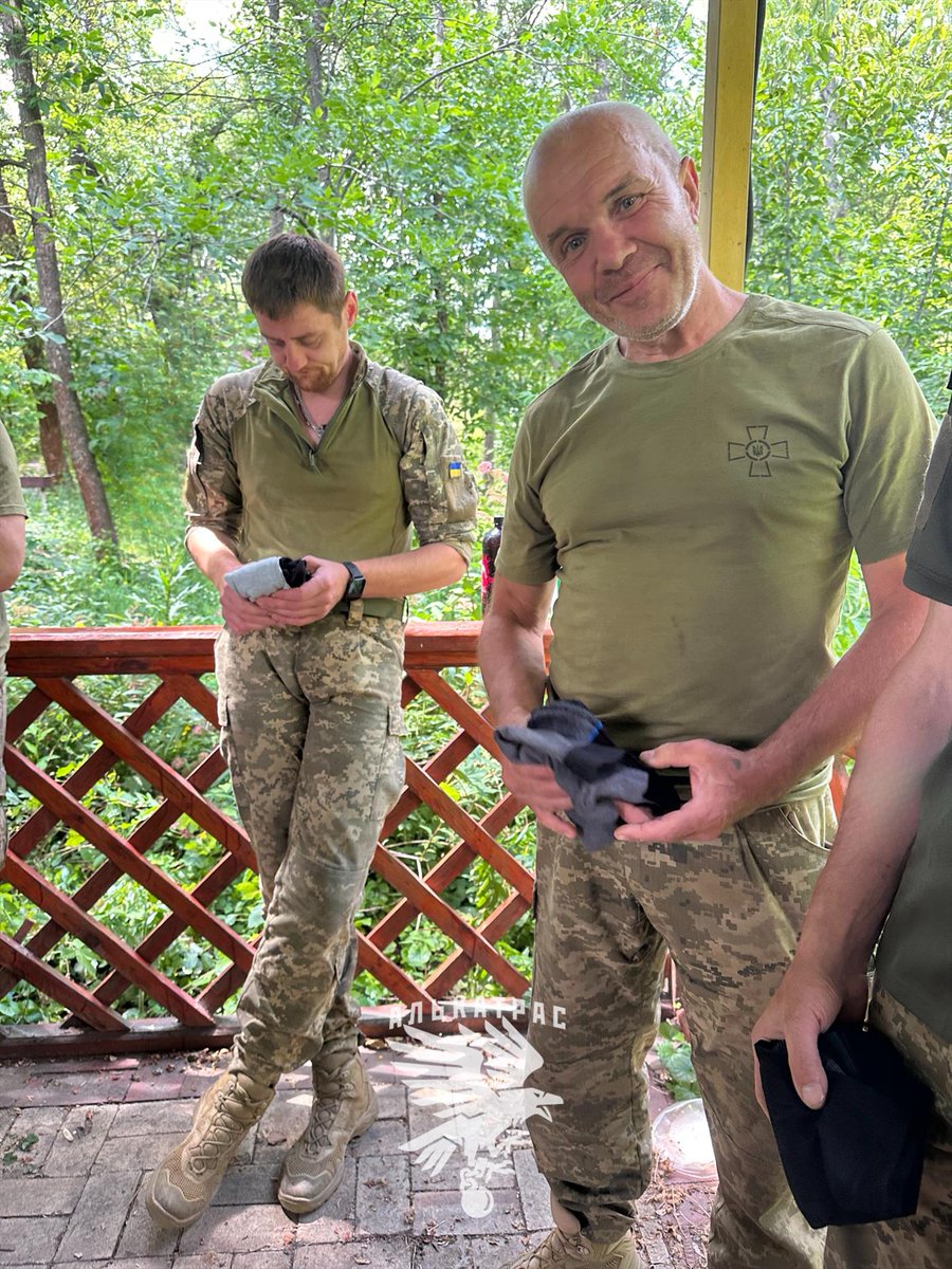 It’s 36°C, the air is thick with dust, and we’ve been sweating through our gear for hours.

Out here, fresh socks and clean underwear aren’t just nice — they’re life-saving morale.

In this photo, we've just had our weekly wash and one of our soldiers just got a new pair. He’s