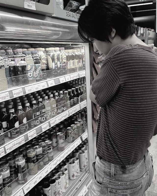 I move like your good boy in a slow film—like carrying your hand, dressed in ease. Look close, I glow different beside you. Even shopping turns graceful, like I was made for soft smiles, warm hands, and strolls that feel like forever with you.