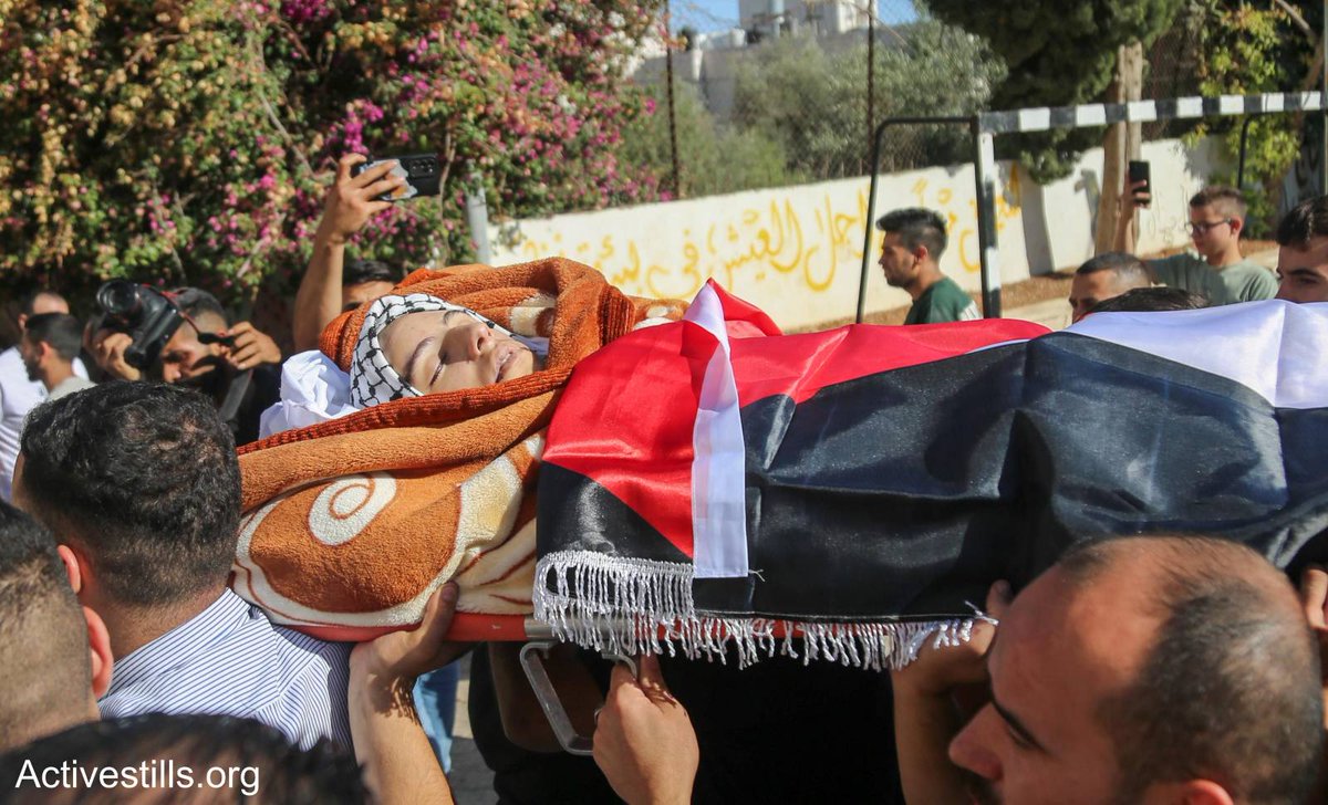 YESTERDAY: Palestinians bid farewell to 19-year-old Ahmed Nafeth Al-Awiwi in the city of Hebron. He died from brain damage sustained after being shot in the head by Israeli colonial forces during a raid on Hebron about six months ago. Photos: <a href="/MosabShawer/">mosab.shawer</a> /Activestills.