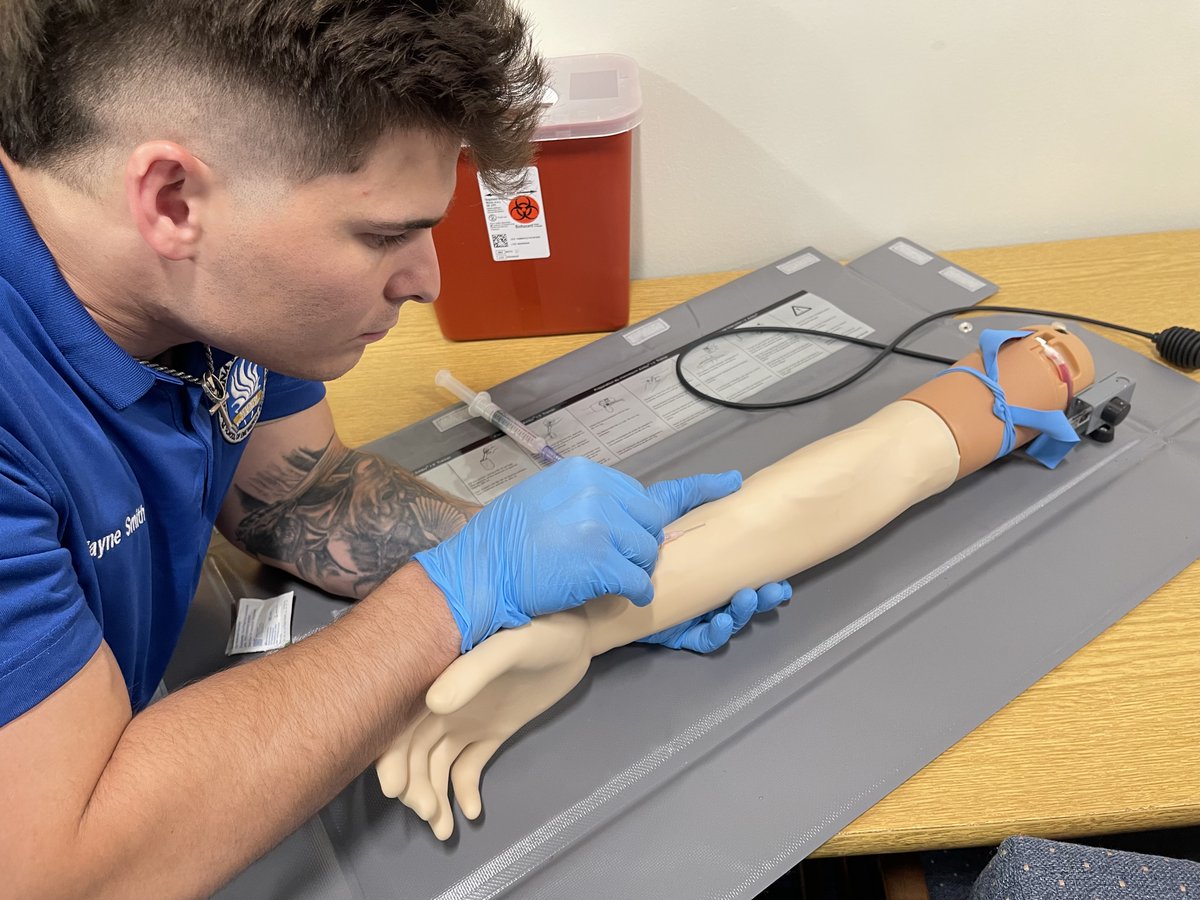 Zayne Smith, a student in the inaugural cohort of Daytona State’s Paramedic Certificate program at the Flagler/Palm Coast Campus, practices IV insertion on a task trainer mannequin.  
Learn more: bit.ly/DSC_Paramedic